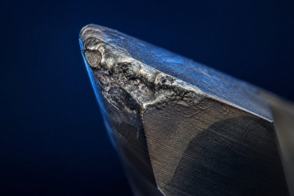 Built-up edge welded onto a carbide cutting edge