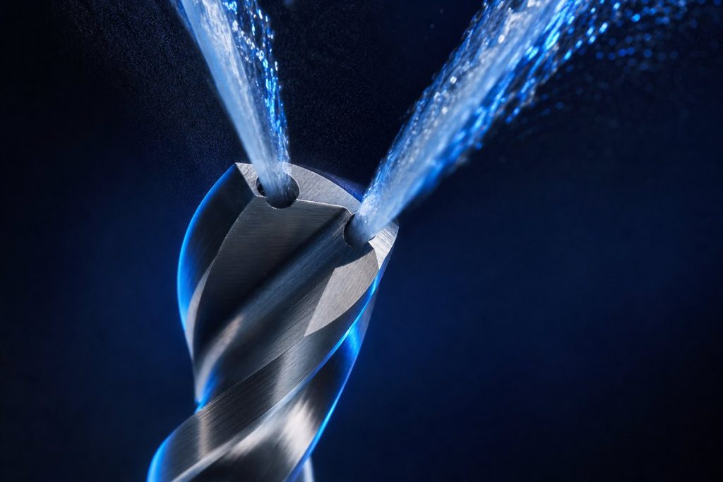 Carbide drill with through-tool coolant jets